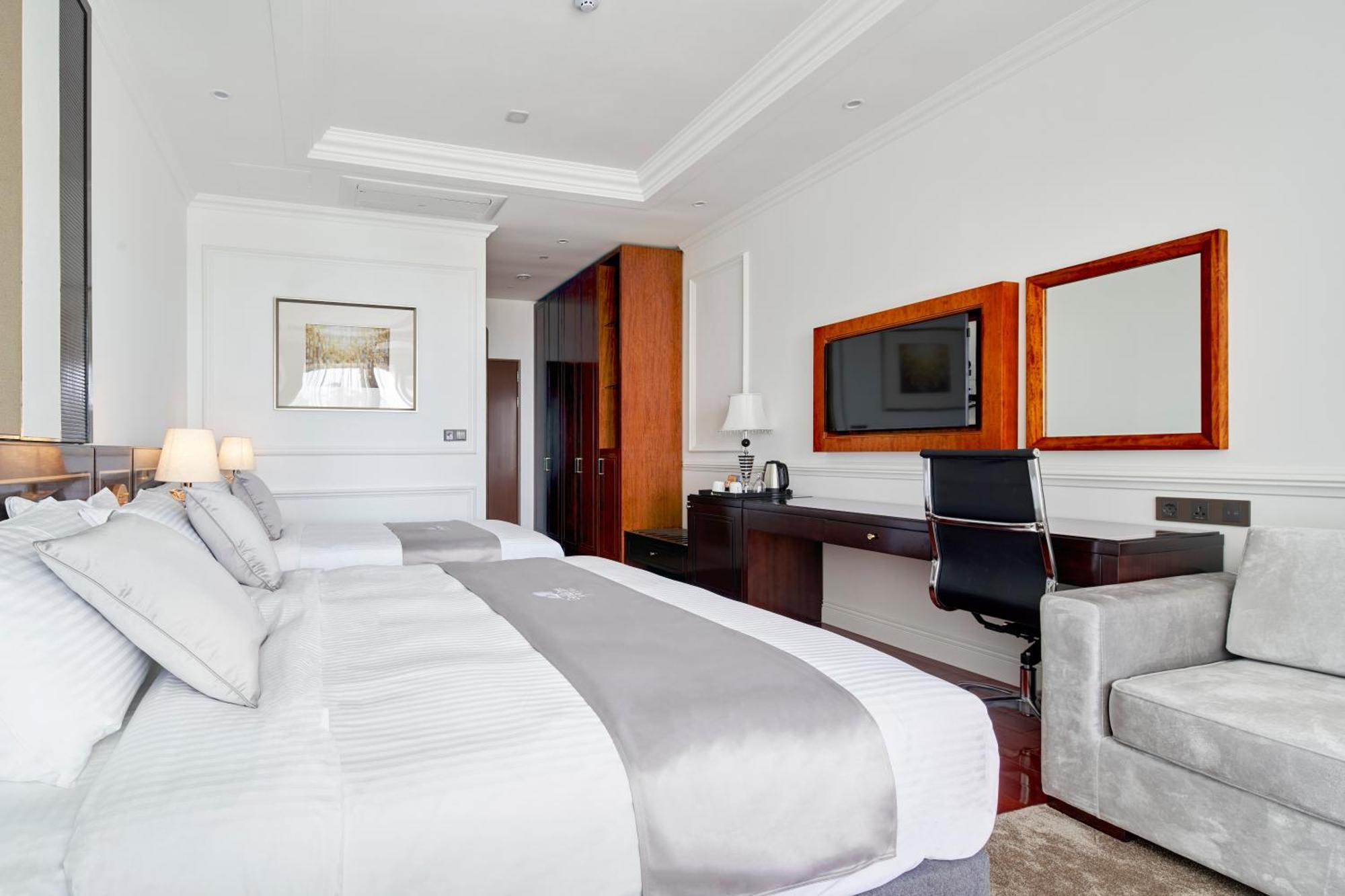 GoldOne Hotel & Suites Seogwipo Zimmer foto